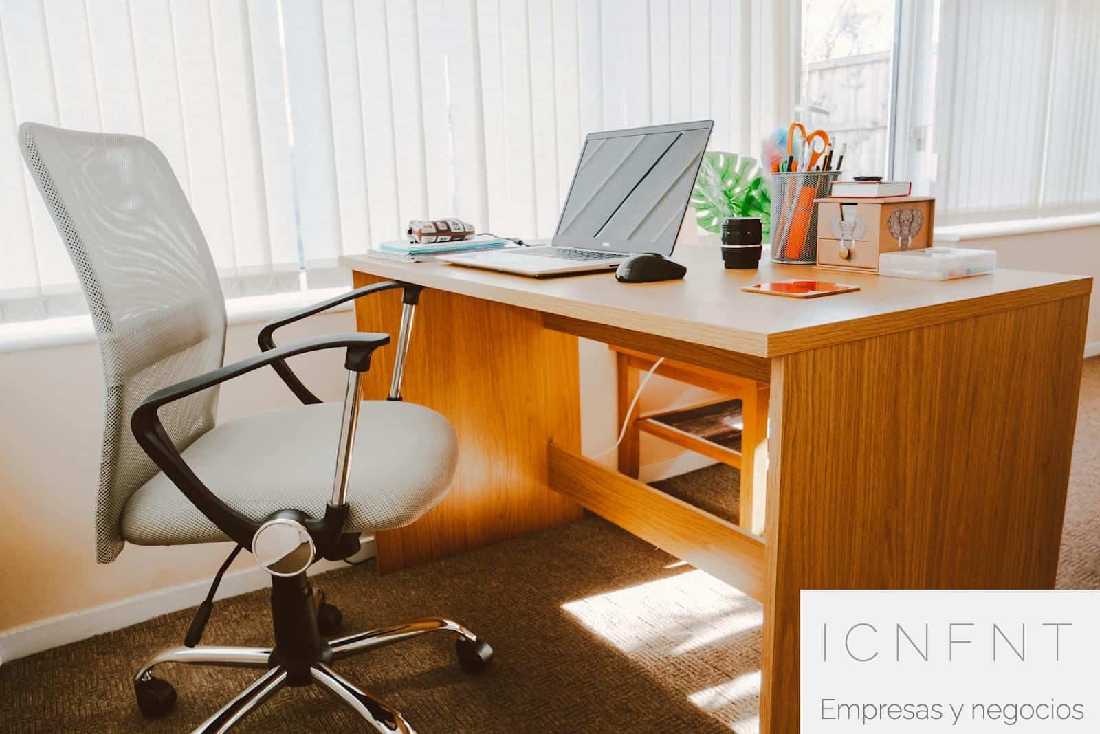 White Rolling Armchair Beside Table