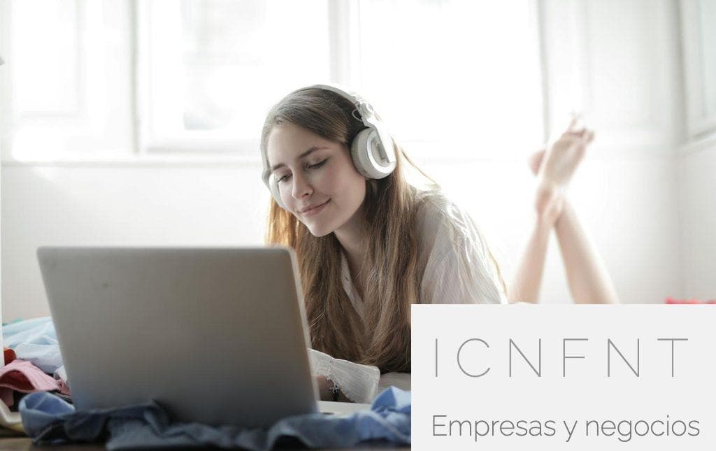 Woman in White Shirt Using Silver Macbook