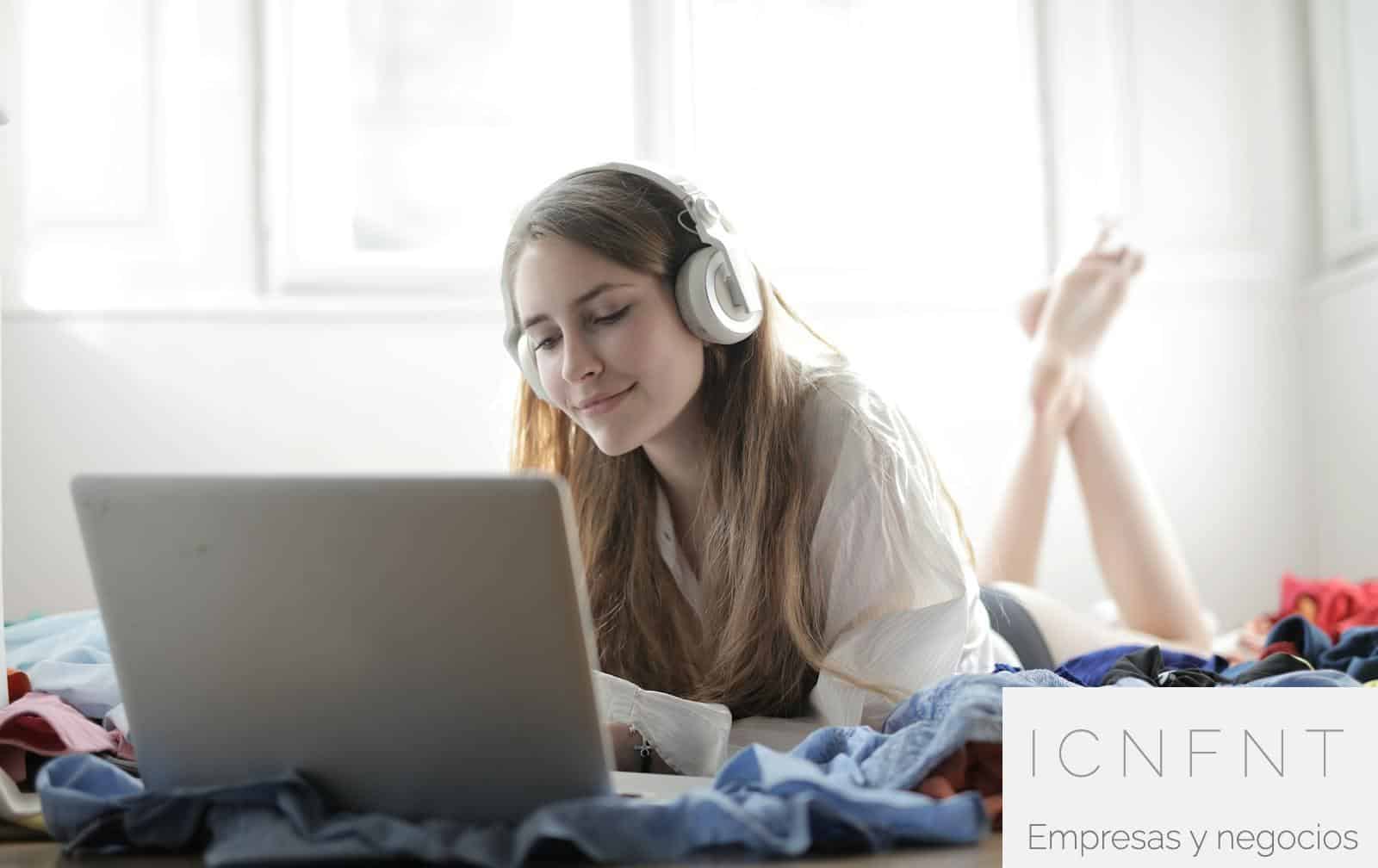 Woman in White Shirt Using Silver Macbook