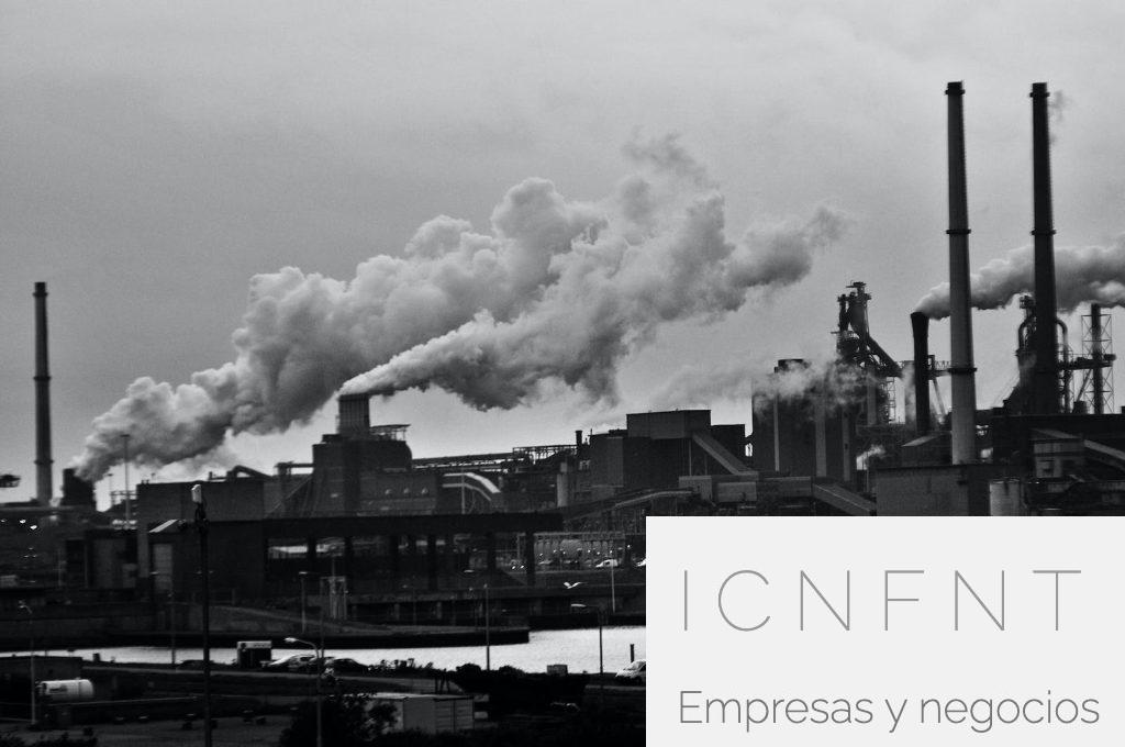 Grayscale Photography of Locomotive Train Beside Factory