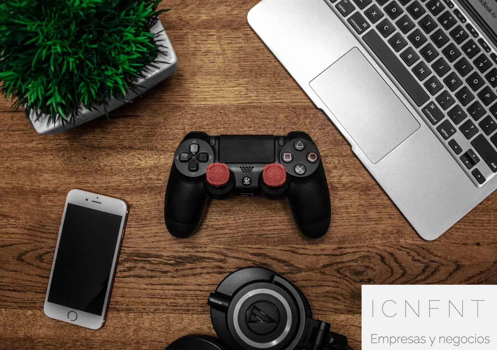 Black Game Console on Wooden Surface